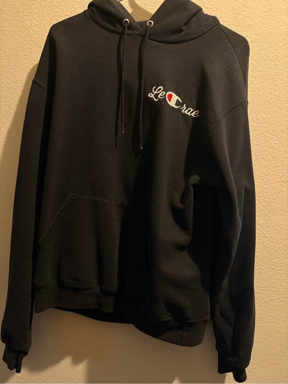 Champion Black Hoodie with Small Script Logo and Red Accent